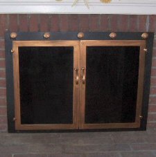 falmouth square in black and antique copper with shells on fram and twin doors