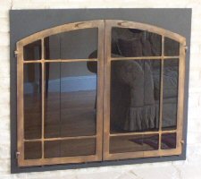 square to arch window pane in black and bronze with full fold doors